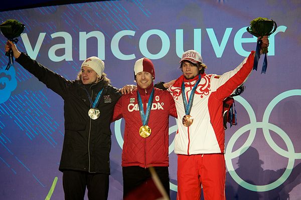 From left to right: Martins Dukurs of Latvia (silver), Jon Montgomery of Canada (gold), and Aleksandr Tretyakov of Russia (bronze) with the medals the