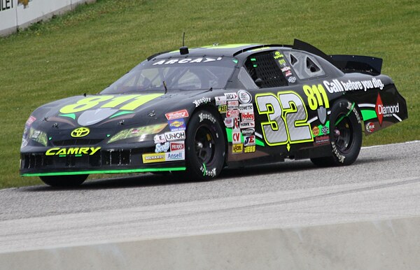 Mingus competing in the ARCA race at Road America in 2013