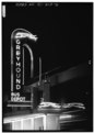 NORTHWEST (FRONT) FACADE, NEON SIGN, EVENING VIEW, LOOKING NORTH - Greyhound Bus Station, 1200 Blanding Street, Columbia, Richland County, SC HABS SC,40-COLUM,16-6.tif