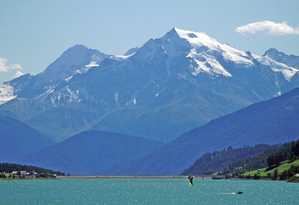 left summit: the Königspitze, right summit: the Ortler; seen from Lake Reschen