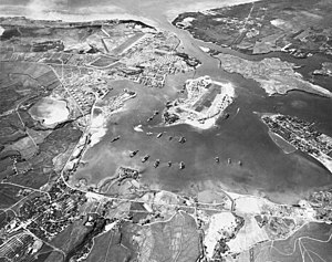 Pearl Harbor on October 30, 1941, looking southwest. Ford Island is at its center. Pearl Harbor looking southwest-Oct41.jpg