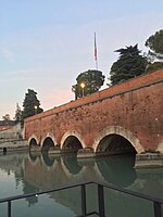 The bridge in Peschiera del Garda where Lake Garda discharges into the Mincio, denoting the beginning of the river.