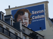 Publicité murale du savon Cadum situé au no 5 boulevard Montmartre.