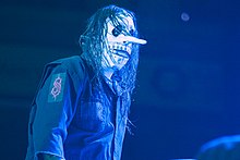 Percussionist Chris Fehn was fired from Slipknot in March 2019, after suing the band claiming unpaid royalties. Slipknot - The Grey Chapter Tour 2016 - Dusseldorf - 00568151 - Leonhard Kreissig - Canon EOS 5D Mark II.jpg