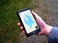Smartphone with navigation map app.jpg