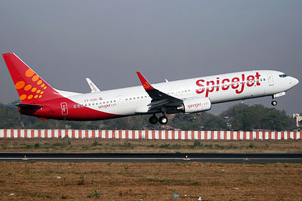 A SpiceJet Boeing 737-900ER taking off from Surat Airport