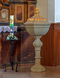 Baptismal font and Paschal candle