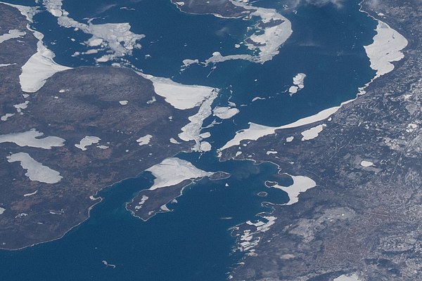 Taken on April 10, 2022, during Expedition 67 of the International Space Station; north is oriented to the right. Mackinac County's border with Emmet 