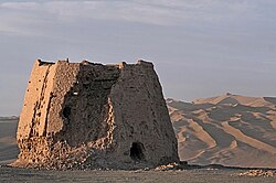 The ruins of a Han dynasty (202 BC–220 AD) Chinese watchtower made of rammed earth at Dunhuang, Gansu province, the eastern edge of the Silk Road