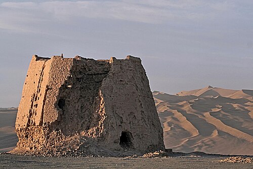 The ruins of a Han dynasty (202 BC–220 AD) Chinese watchtower made of rammed earth at Dunhuang, Gansu province, the eastern edge of the Silk Road
