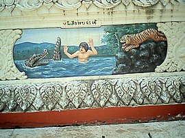 廟裡描繪諺語的畫作「逃出虎口卻遇到鱷魚」