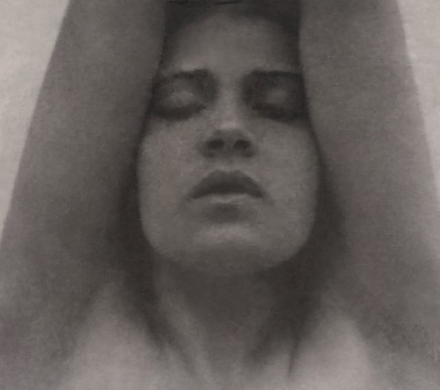 Tina Modotti with arms raised - Edward Weston, c. 1921