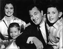 Nuclear families such as this one (pictured 1956) were in retreat by the last third of the twentieth century. Tony Martin Cyd Charisse and family 1956.JPG