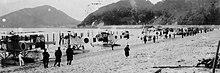 A row of nine Type 14 reconnaissance seaplanes in 1927 on Tonomi Beach (Japanese: 富海), east of Hofu in Yamaguchi Prefecture. The tailcodes of the three seaplanes on the left reveal their affiliation with Notoro. They are from left to right, ノトロ-10, unknown, ノトロ-23 and ノトロ-11.