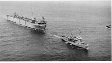 Atakapa brings Oak Ridge into Rota, Spain, 26 June 1964. USS Atakapa (ATF-149).jpg