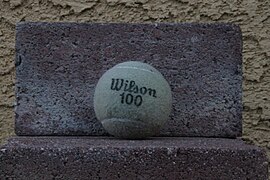 Wilson 100 Tennis Ball on Bricks.jpg