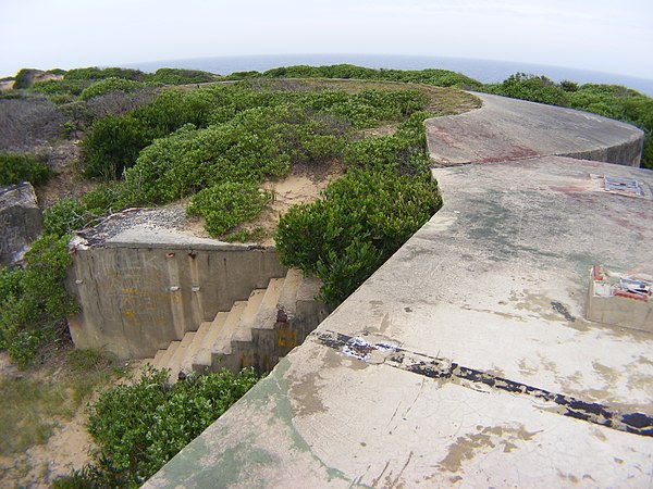 Partially buried gun emplacement that formed part of Fort Banks