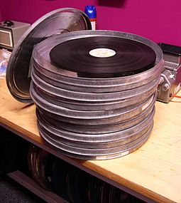 Each 35 mm roll contains a maximum of 2,000 feet, or 22.22 minutes of running time at 24 fps, with a customary maximum of 18-19 minutes. 35mm cinema release print.jpg