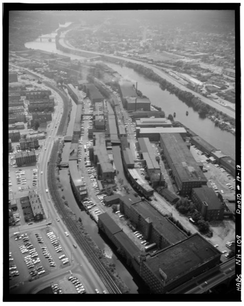 File:AERIAL PHOTO -18- VIEW LOOKING SOUTH, FORMER STARK MILLS AREA IN FOREGROUND - Amoskeag Millyard, Canal Street, Manchester, Hillsborough County, NH HABS NH,6-MANCH,2-18.tif