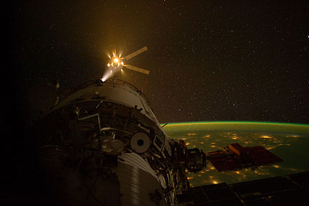 ATV-3 Edoardo Amaldi approaches ISS on the dark side of the Earth with thrusters firing, 2012