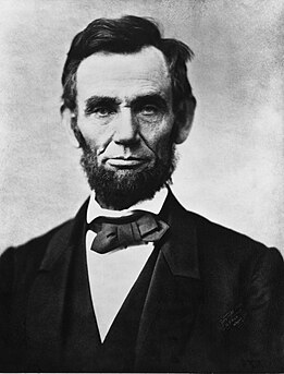 Abraham Lincoln, an "Old Henry Clay tariff Whig" by his own definition, enacted much of the American School's core policies into law during his tenure as President from 1861 through 1865 Abraham Lincoln head on shoulders photo portrait.jpg