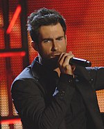 Adam Levine, musicien né le 18 mars 1979.