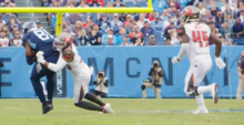 Adams making a tackle in a game against the Tennessee Titans Andrew Adams.png