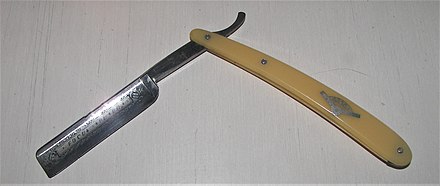 Antique razor with square point, full hollow ground 16 mm (5⁄8 in) blade and double transverse stabiliser