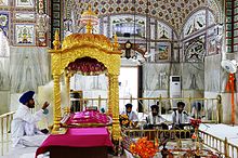 The Sikh scripture Guru Granth Sahib in a Gurdwara Baba Bakala Darbar Sahib.jpg