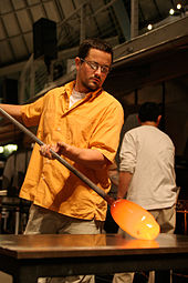 Glassblower Jean-Pierre Canlis sculpting a section of his piece "Insignificance" Bamboo Framing.jpg