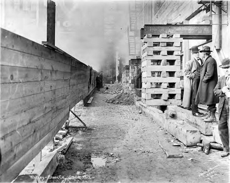 File:Building supports in alley next to the Smith Tower construction site, Seattle, Washington, January 2, 1912 (SEATTLE 4875).jpg