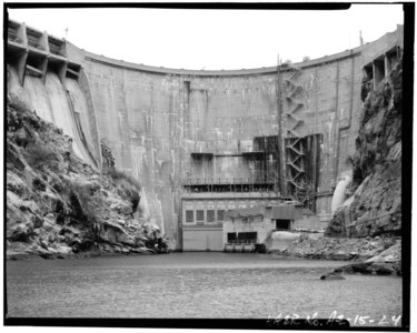 Downstream view of Horse Mesa Dam. CLOSE-UP VIEW OF HORSE MESA DAM. HEFU PENSTOCK IS AT CENTER RIGHT, AND LEFT (OR SOUTH) SPILLWAY CHUTE IS AT UPPER RIGHT - Horse Mesa Dam, Salt River, 65 miles East of Phoenix, HAER ARIZ,7-PHEN.V,3-24.tif