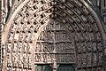 Tympanon głównego portalu katedry w Strasburgu, ok. 1220 – wśród postaci znajdują się nadzy Adam i Ewa – przykład średniowiecznego aktu