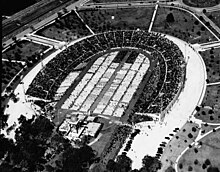 An aerial view of City Park Stadium in New Orleans, filled with worshippers at the National Eucharistic Congress of 1938 CityParkStadiumEucharisticCongress1938.jpg