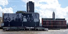 Sea Containers House decorated with a large photograph of her Silver Jubilee Cmglee Sea Containers House OXO Tower jubilee.jpg