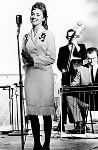 Smith performing for a crowd of 5,000 people, August 1964. Connie Smith--Nashville Concert--1964.jpg