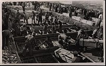 Casualties of the Convoy of 35 being brought to burial in January 1948 Convoy burial.jpg