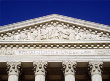 The inscription Equal Justice Under Law as seen on the frieze of the United States Supreme Court Building CourtEqualJustice.JPG