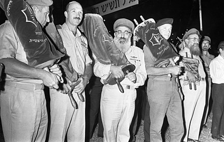 Simchat Torah holiday celebration in the Israeli army with Rav Goren in 1969