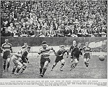 Jim Rutherford of St George chasing the ball with Bert Leatherbarrow and John Donald of Devonport following behind. Devonport v St George Sep 23, 1933.jpg