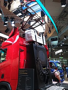 Scania R-series trolleytruck on display at a motor show in Germany. Note:the double pantograph seen on the back of the driver's cabin E-LKW 20180923 121847743.jpg