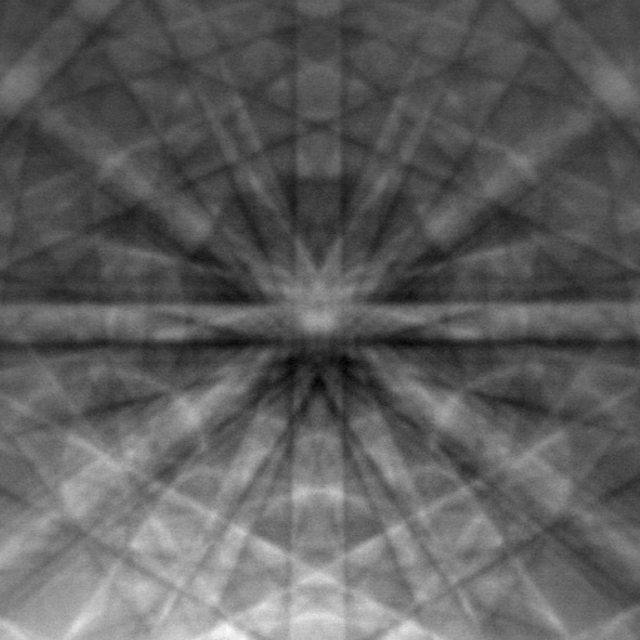 An electron backscatter diffraction pattern of monocrystalline silicon, taken at 20 kV with a field-emission electron source. The Kikuchi bands intersect at the centre of the image