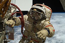 Oleg Kotov participates in a spacewalk on 14 January 2010