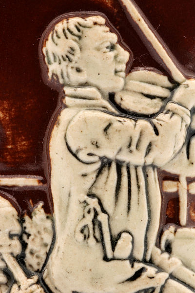 File:Faience beer stein with ball scene on brown background 35.jpg