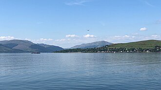 The Firth of Clyde at Kilcreggan, with PS Waverley approaching across Loch Long Firth of Clyde at Kilcreggan, with Waverley passing Loch Long.jpg