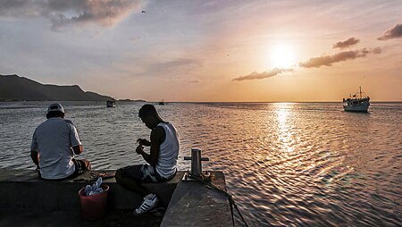 Fail:Fishermen with his son on Pier Juan Griego.jpg