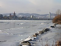 A look upstream from the Donauinsel in Vienna, Austria during an unusually cold winter (February 2006). A frozen Danube usually occurs just once or twice in a lifetime.