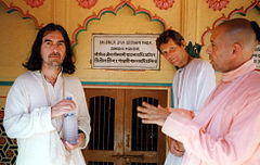 Harrison (left) with friends from the Hare Krishna movement in 1996. The song helped establish his legacy as one of rock music's most overtly spiritual songwriters. George Harrison Vrindavan.jpg