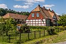 Residential house with stable building on the courtyard side