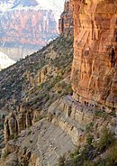 Muav Limestone cliff example, below Redwall Limestone cliff, on the North Kaibab Trail (closeup photos, often show purple erosion debris)(expandable photo)